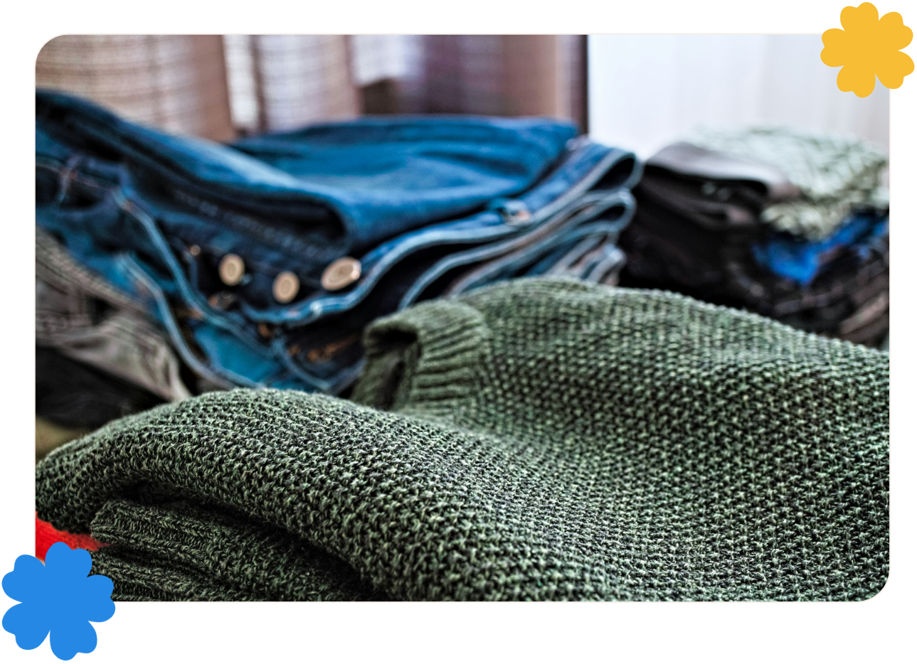 Jeans and sweaters stacked neatly